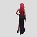 Woman with red hair wearing black strapless long dress with slit and black high heels