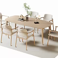 Minimalist Light Wooden Oval Dining Table Set With Six Chairs And Green Plant Decor