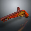 Vintage Red and Gold Pistol Featuring Wooden Grip and Shiny Metal Parts