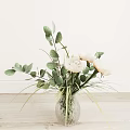 Transparent Glass Vase With White Roses Green Eucalyptus Leaves And Decorative Grass