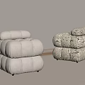 Textured Light Colored And Patterned Ottoman Stools On Black Geometric Rug With Light Wall Background 3d model
