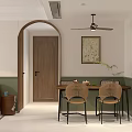 Cozy Dining and Living Room Interior With Archway Wooden Door Woven Chairs And Ceiling Fan