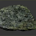 Natural Green And Black Raw Stone With Rough Surface And Mineral Texture