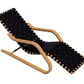 Black Woven Lounge Chair with Light Wooden Frame and Curved Armrest for Comfortable Relaxation