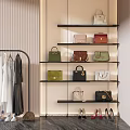 Stylish Clothes Display With Hanging Dresses Coats And Designer Bags Shoes