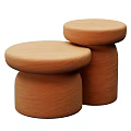 Two Terracotta Round Functional Tables With Textured Surface And Stackable Design
