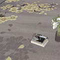 Gray Floor Tiles With Floral Pattern And Vase Of Flowers Near Stacked Magazines Indoors