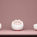Cat Paw Shaped White Lazy Sofa With Pink Cushion On Pink Background