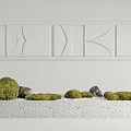 Mini Garden Decor With Green Moss Stones On Speckled Countertop And Geometric Wall Panel