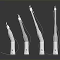 Silver Dental Handpieces In Various Sizes With Connected Wires On Dark Background