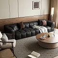 Black Leather Multi Seater Sofa With Throw Pillows And Wooden Coffee Table On Area Rug