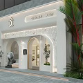 SPA MANA Shopping Mall Storefront With White Arched Doorways Green Plants And Stone Lion