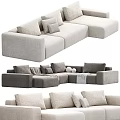 Modern Sectional Sofa Design With Soft Cushions Throw Blankets And Neutral Beige Gray Tones