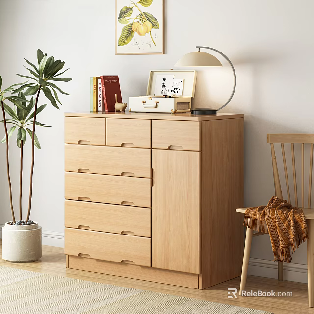 Light Wooden Chest of Drawers with Books Photo Frame Table Lamp Green Plant and Chair 3d model 
