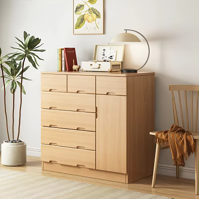 Light Wooden Chest of Drawers with Books Photo Frame Table Lamp Green Plant and Chair 3d model
