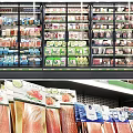 Supermarket Freezer Display With Well Stocked Various Frozen Foods And Organized Shelves