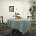 Round Dining Table Set With Striped Tablecloth Fruits Plants And Wooden Chairs With Woven Seats