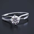 Sparkling Diamond Rings With Large Center Stones And Small Inlaid Gems On Silver Bands