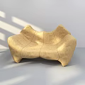 Modern Beige Leather Two Seater Sofa With Unique Curved Shape And Stitched Details