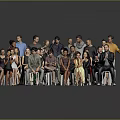 Large Group of Diverse People Standing and Sitting Together in Social Gathering
