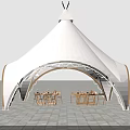 Outdoor White Tent Structure With Decorative Arch And Dining Tables Chairs On Stone Pavement
