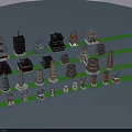 Various Traditional Architectural Tower Models With Different Sizes And Colorful Designs Arranged on Green Grass