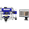 Advanced Industrial Equipment Featuring Automated Mechanical Arm Precision Control And Computer Monitoring Interface