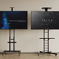 Modern Televisions on Black Stands Showing Clear Content in Indoor Setting