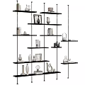 Decorative Ornaments Set on Black Multi Layered Shelf with Vases Sculptures Photo Frames and Books