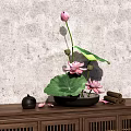 Black Vase With Pink Lotus Flowers And Green Leaves On Wooden Cabinet Gray Textured Wall