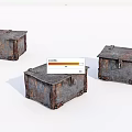 Three Vintage Rusty Metal Chests With Worn Edges And Rusted Surfaces