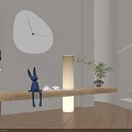 White Irregular Shaped Clock Hanging On Beige Wall With Wooden Bench And Blue Rabbit Decor