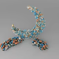 Beautiful Crescent Moon Decorative Arrangement With Blue Orange Flowers Crystal Accents And Scattered Blooms
