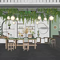 Lush Green Plant Specialty Store Interior With Hanging Vines Pendant Lights White Shelves And Wooden Tables