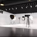 Professional Photography Studio Setup With Camera On Tripod Softboxes And Lighting Equipment