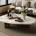 Oval Marble Coffee Table with Wooden Base Adorned with Flower Vase Tray and Books
