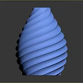 Green Leafy Plant in Blue Spiral Vase on Dark Reflective Surface