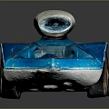 Blue Toy Race Car With Silver Top Red Rimmed Wheels And Shiny Metallic Finish
