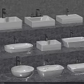 Various White Washbasins With Different Shapes And Faucets On Gray Countertop