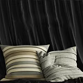 Soft Striped Decorative Pillows In Neutral Tones On Dark Fabric Surface 3d model