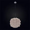Modern White Pendant Light with Cascading Wavy Design Hanging Against Black Background