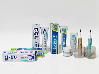 Essential Daily Oral Care Products Including Toothpaste Toothbrush And Packaging Containers 3d model
