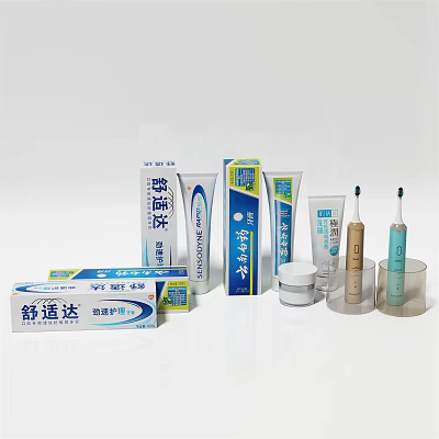 Essential Daily Oral Care Products Including Toothpaste Toothbrush And Packaging Containers 3d model