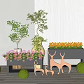 Elegant Flower Planters With Purple Orange Flowers Deer Figurines Green Spherical Plants White Wall