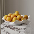 Fresh Ripe Oranges in White Bowl on Marble Countertop with Curtain Background