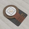 Cozy Dinnerware Set with Black Plate White Card Brown Woven Placemat and Silver Cutlery
