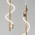Modern Pendant Lights Featuring Glass Cylinders And Brass Spiral Designs For Interior Decor