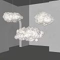 Cloud Shaped Pendant Lights Hanging In Modern Minimalist Interior With Soft Glow
