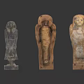 Three Ancient Egyptian Sculptures Featuring Human Shaped Carvings And Intricate Details