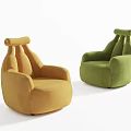 Modern Single Seater Sofa With Yellow And Green Upholstery And Curved Backrest Design